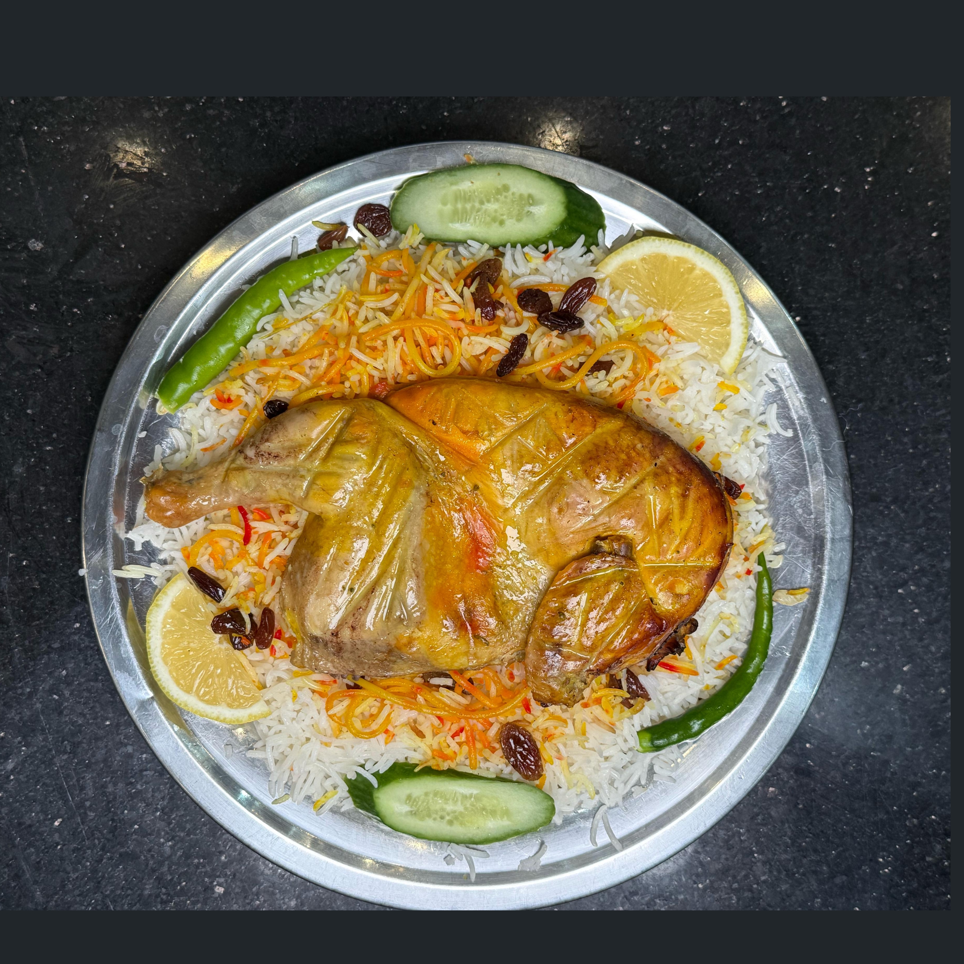 نص دجاج حنيذ مع رز بشاور